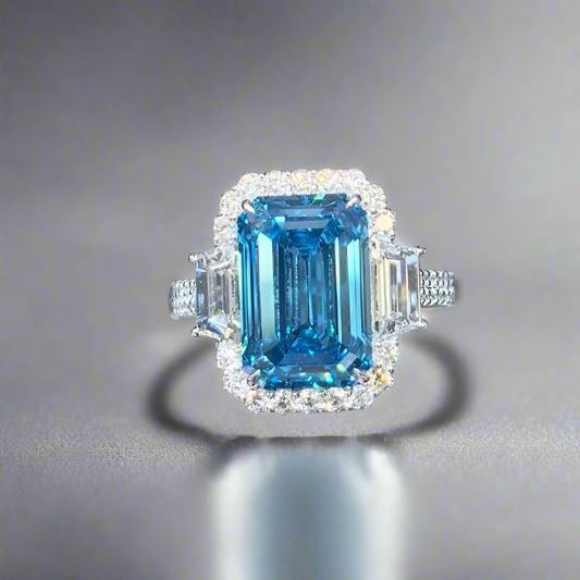 7.00CT VIVID BLUE EMERALD CUT DIAMOND 3 STONE RING