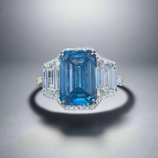 7.00CT VIVID BLUE EMERALD CUT DIAMOND 3 STONE RING