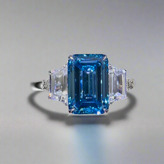 7.00CT VIVID BLUE EMERALD CUT DIAMOND 3 STONE RING