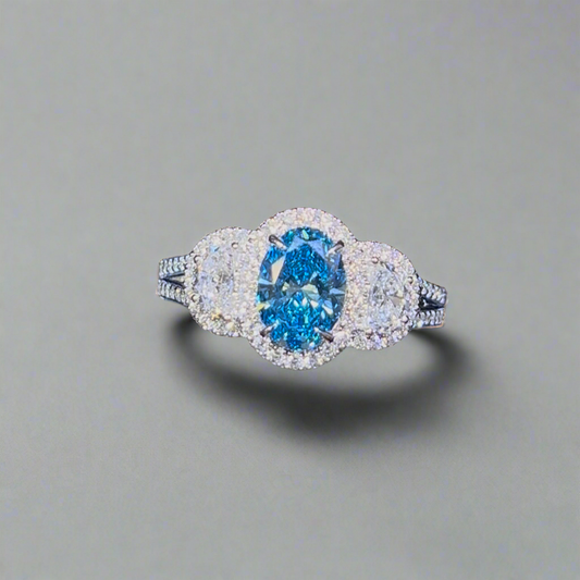 1.00CT VIVID BLUE OVAL CUT DIAMOND 3 STONE RING