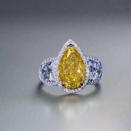 4.50CT VIVID YELLOW PEAR CUT DIAMOND 3 STONE RING